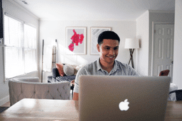 man in front of a computer