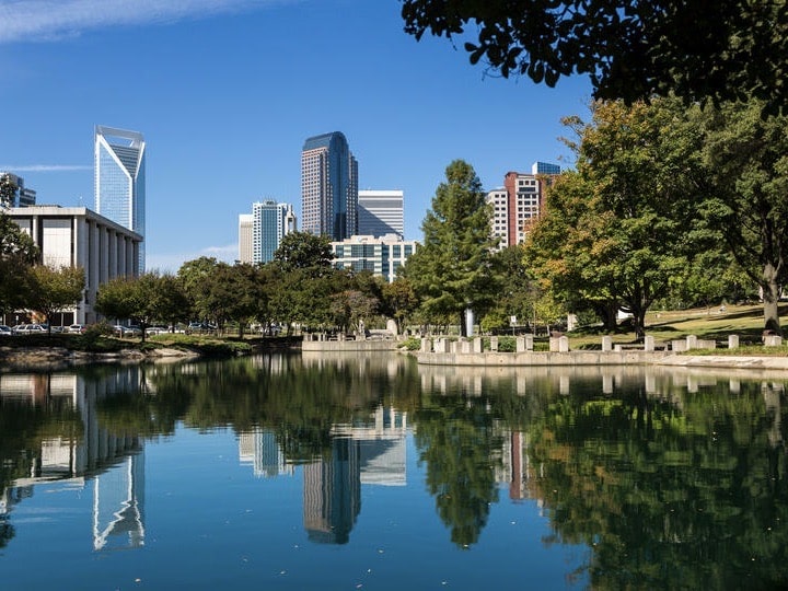 Charlotte skyline reflected in water, NC, USA