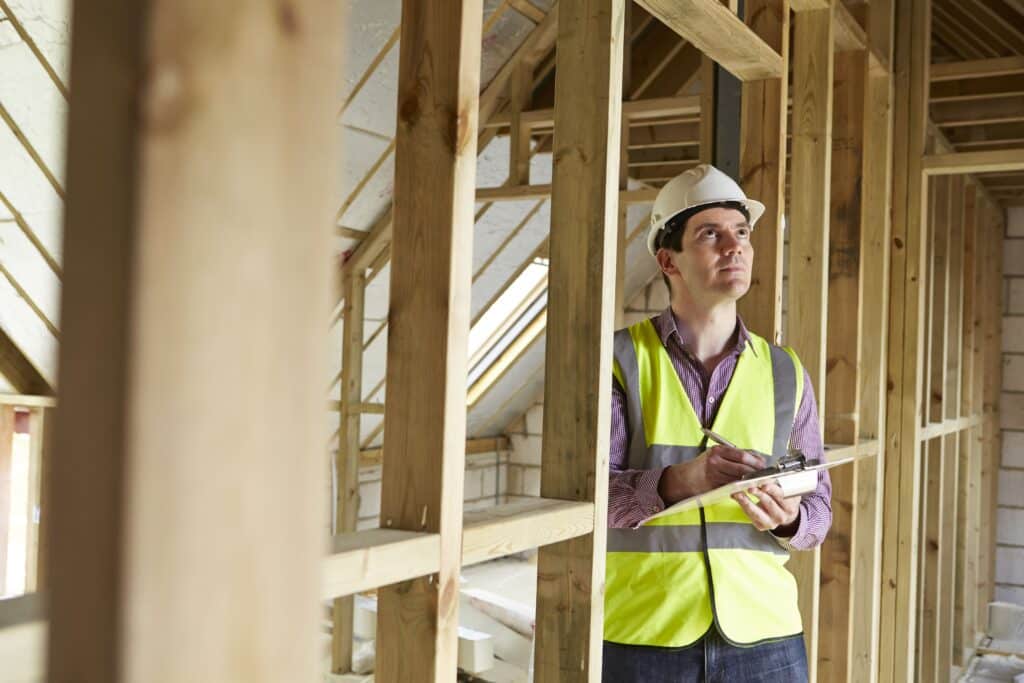 home inspector with clipboard