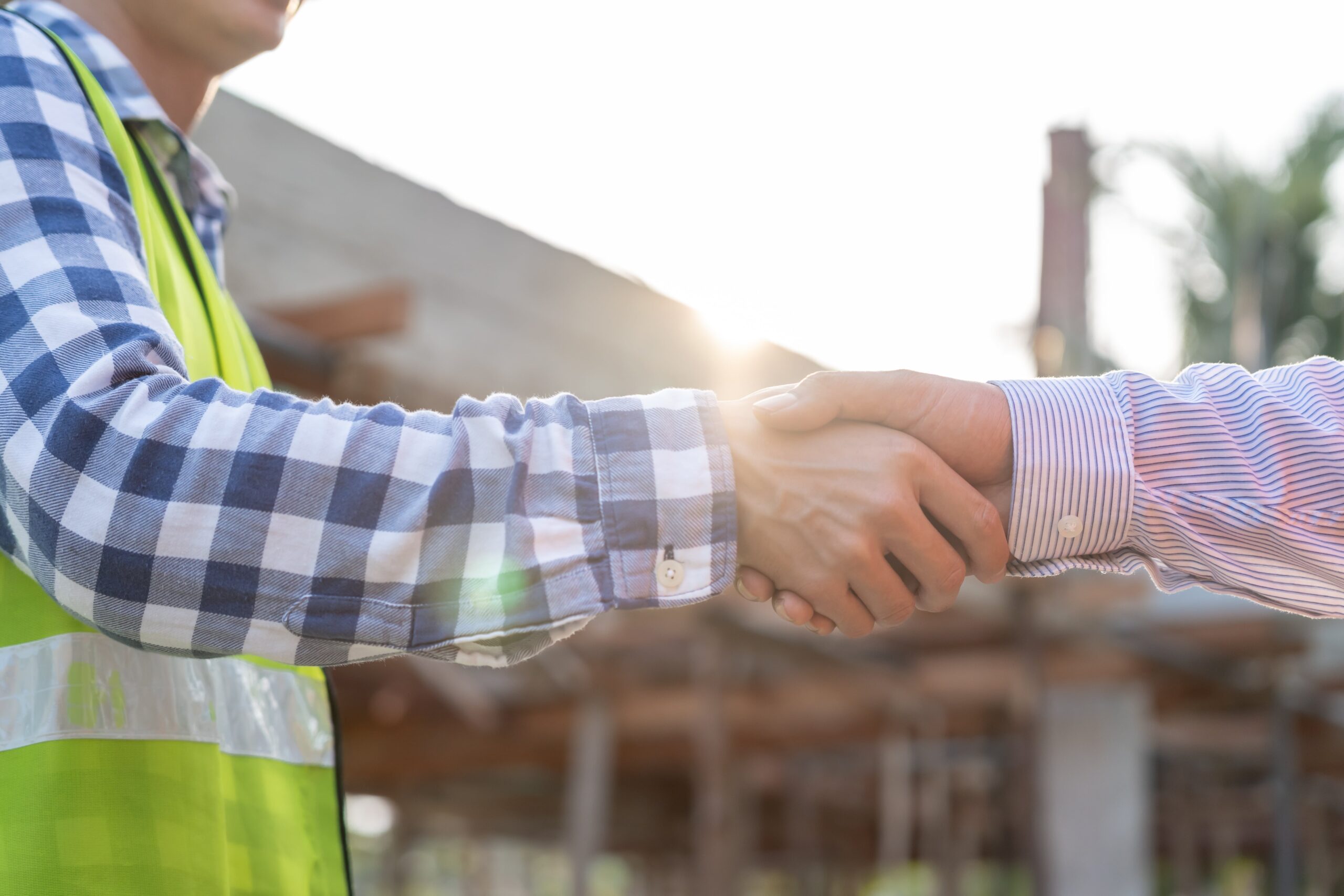 Home inspector shaking hands with someone