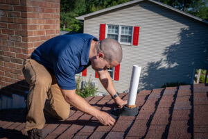 home inspector examining roof details